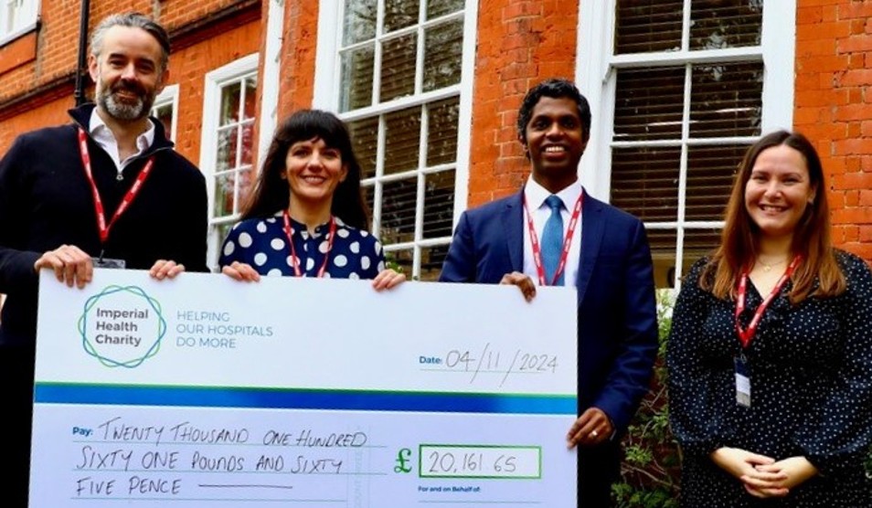 Photo of cheque presentation wiith Arthur, Panorea, Kushan and Beth)